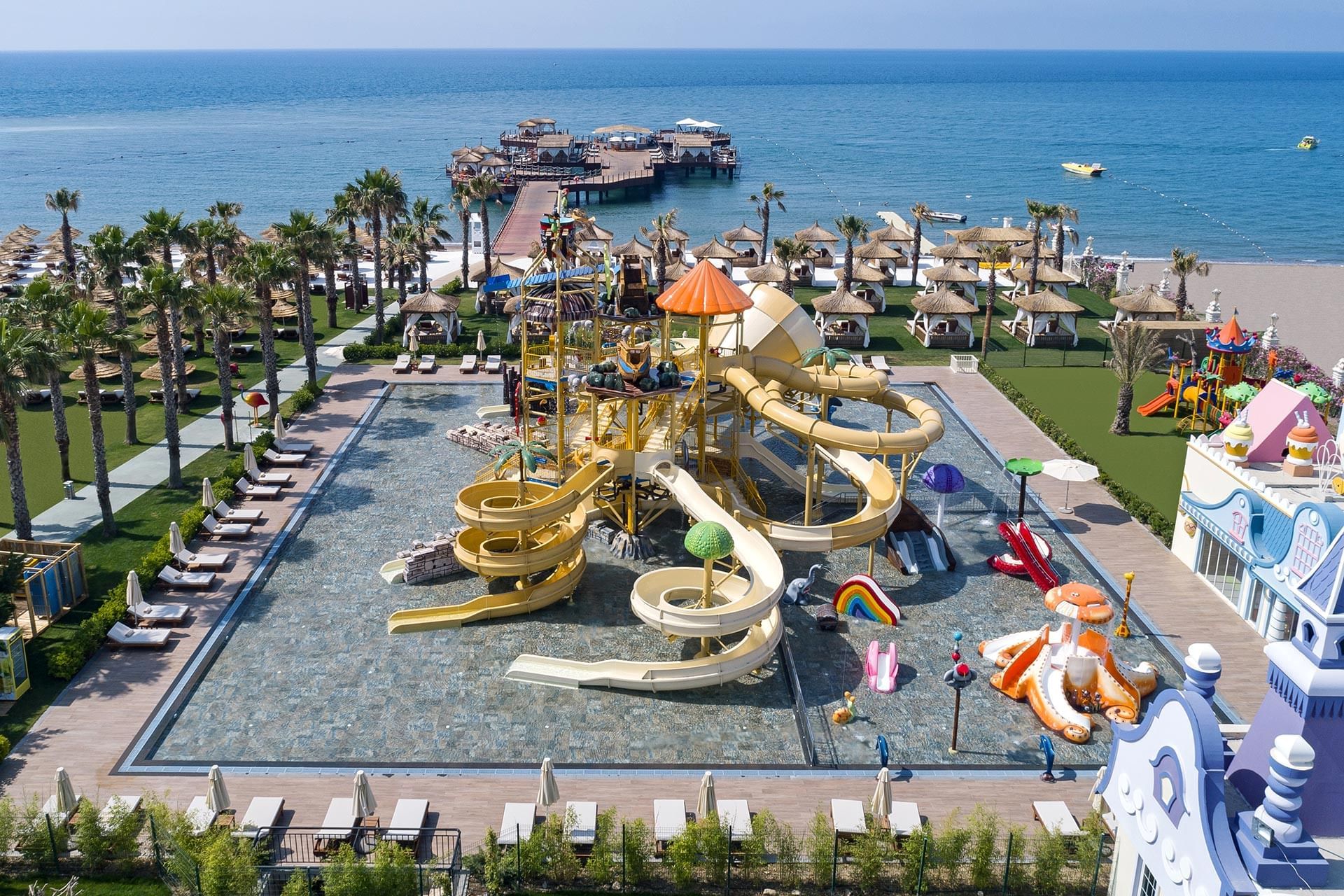 High-angle view of a playground with slides in Tini Kids Club at Titanic Mardan Palace